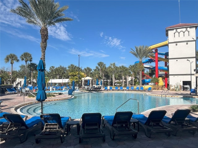 view of swimming pool featuring a patio area