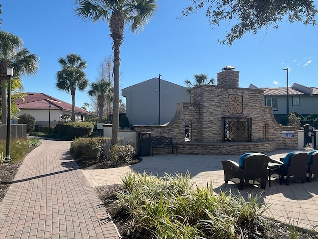 surrounding community with a patio area