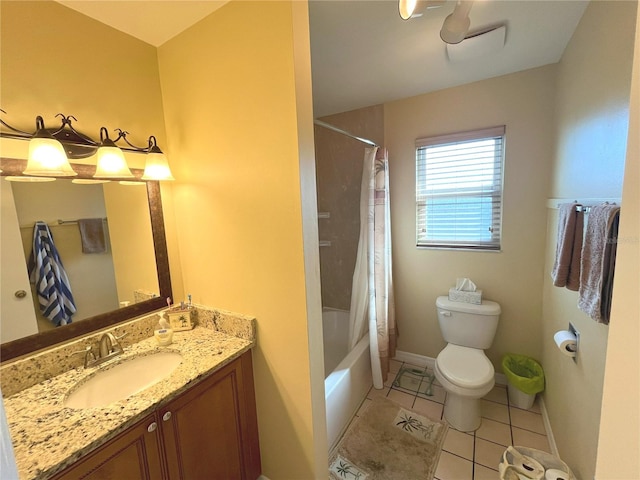bathroom featuring shower / bathtub combination with curtain, toilet, vanity, tile patterned flooring, and baseboards