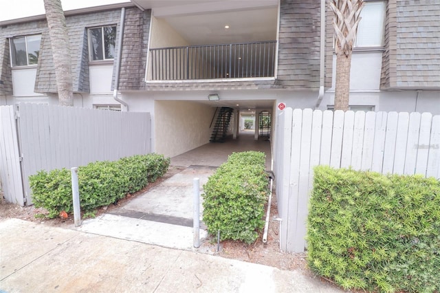 doorway to property featuring a balcony