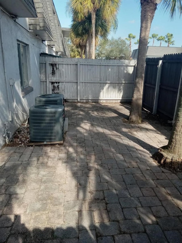 view of patio with central AC