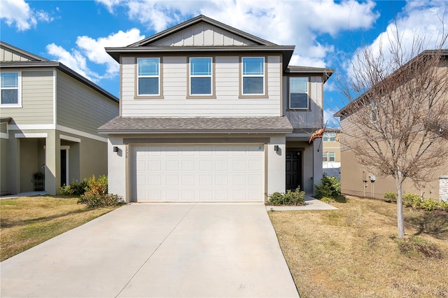 view of front facade with a garage and a front yard