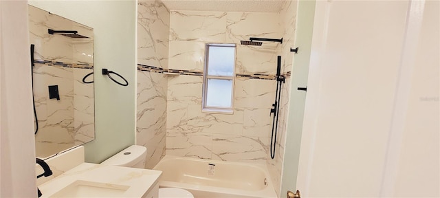 full bathroom with vanity, tiled shower / bath, a textured ceiling, and toilet