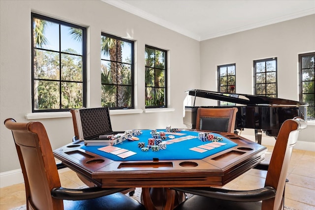 rec room featuring light tile patterned flooring and ornamental molding