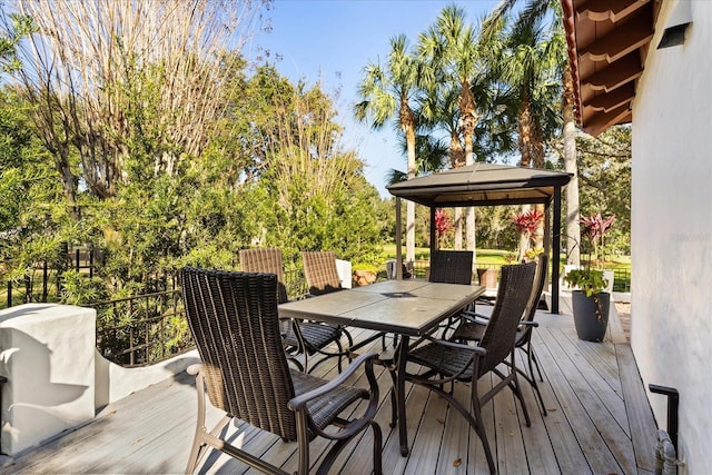 wooden deck with a gazebo