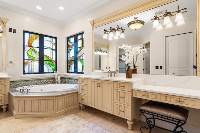 bathroom featuring crown molding, vanity, tile patterned floors, and a tub to relax in