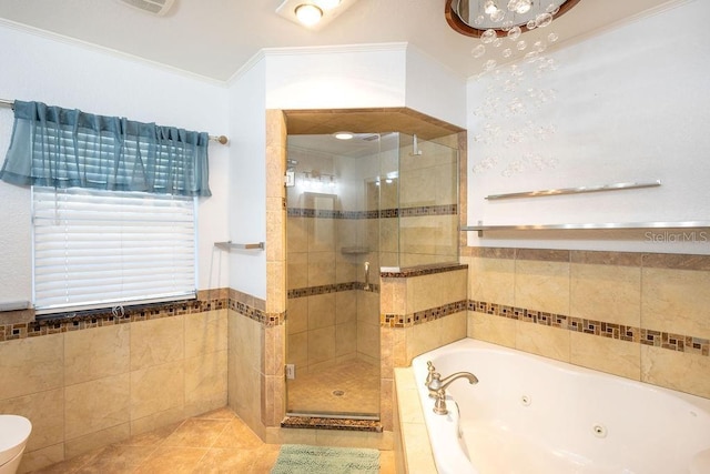 bathroom with tile patterned flooring, ornamental molding, independent shower and bath, and tile walls