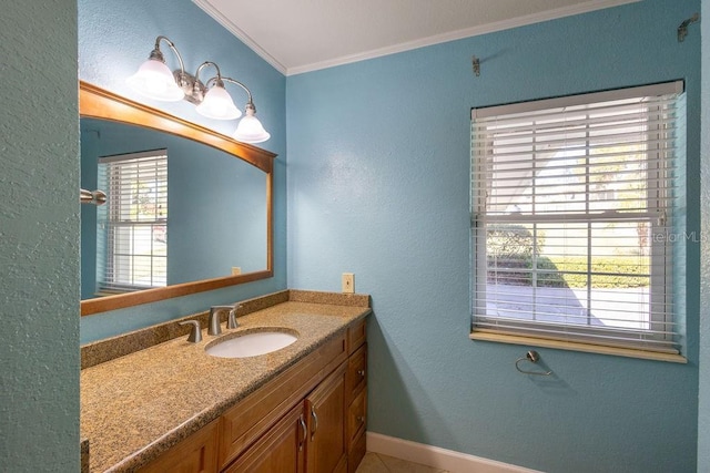 bathroom featuring crown molding and vanity