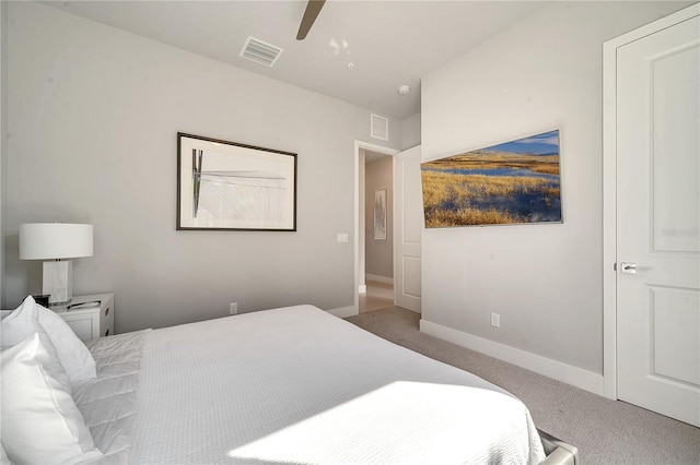 carpeted bedroom with ceiling fan