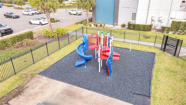 view of playground with a yard