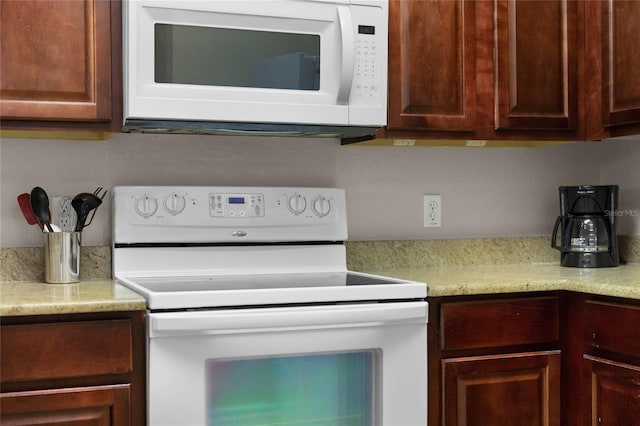 kitchen featuring white appliances