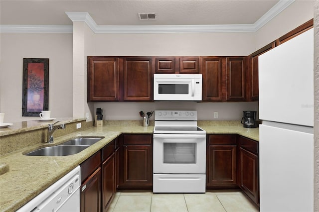 kitchen with sink, crown molding, light stone counters, light tile patterned floors, and white appliances