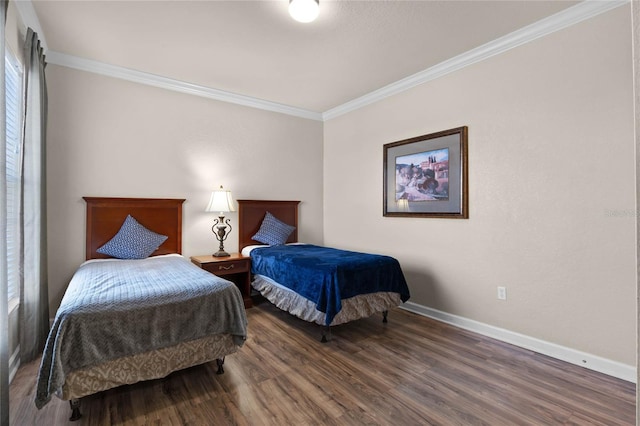 bedroom featuring dark hardwood / wood-style flooring and crown molding