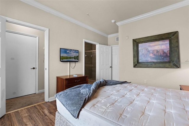 bedroom featuring ornamental molding and dark hardwood / wood-style floors