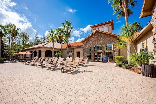 rear view of house featuring a patio