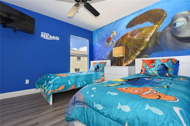 bedroom with hardwood / wood-style flooring and ceiling fan