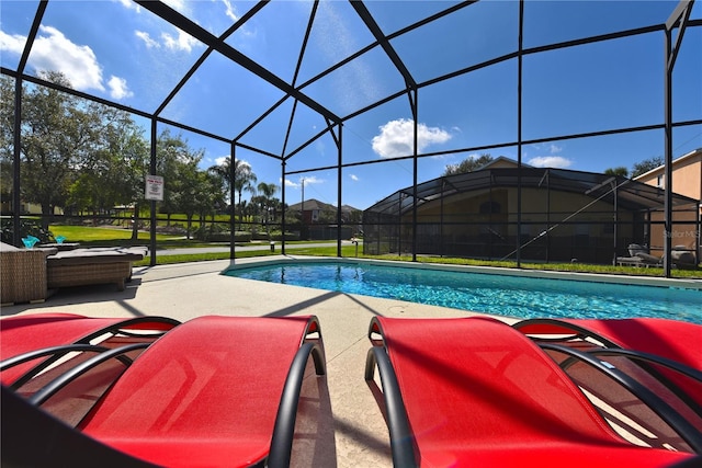 view of pool with a lanai