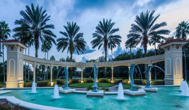 view of pool with pool water feature