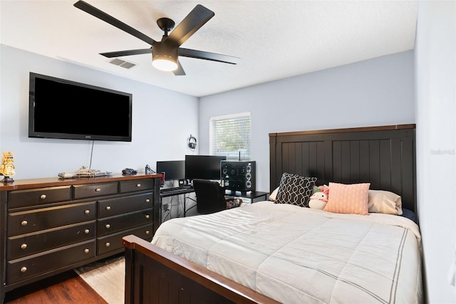 bedroom featuring ceiling fan and light wood-type flooring