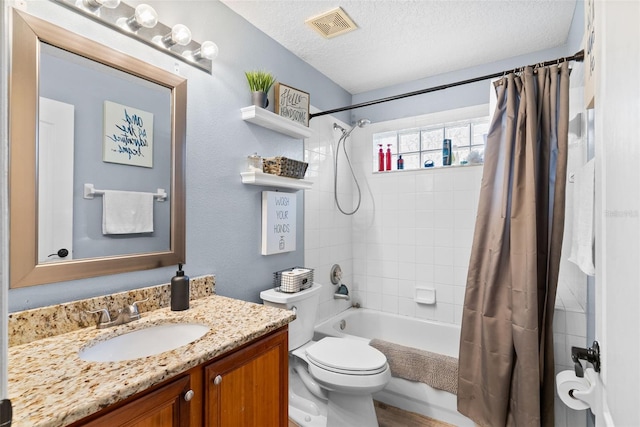 full bathroom with toilet, vanity, shower / bathtub combination with curtain, and a textured ceiling