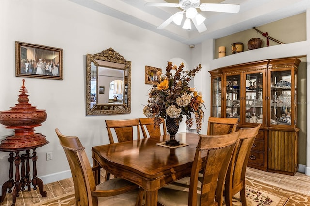 dining space with ceiling fan