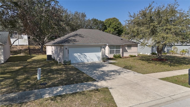 ranch-style house featuring central AC unit, a garage, and a front lawn