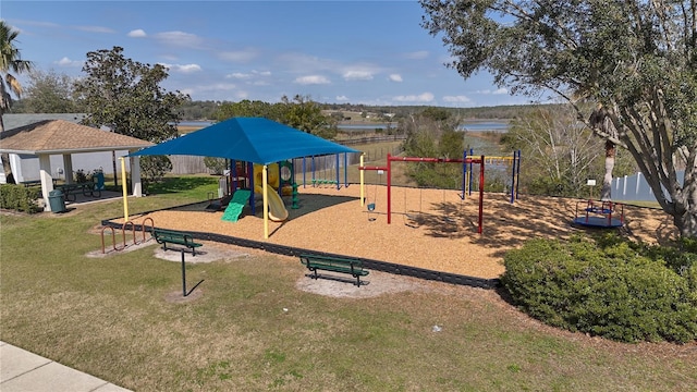 view of playground with a gazebo and a lawn