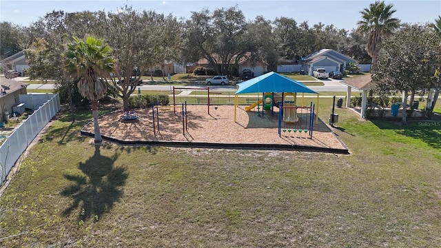 view of playground featuring a lawn