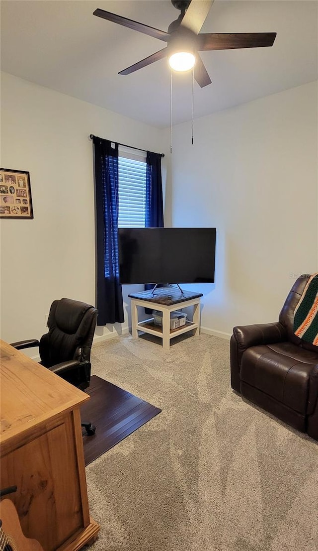 home office featuring ceiling fan and carpet