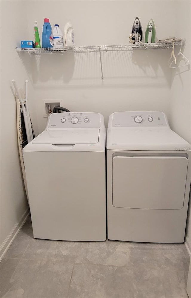 laundry room featuring washing machine and dryer