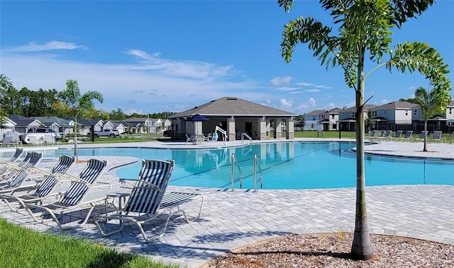 view of pool featuring a patio