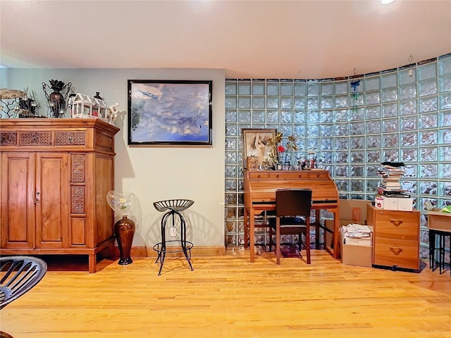 home office featuring hardwood / wood-style floors