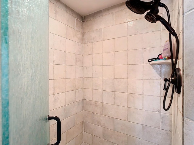 bathroom featuring an enclosed shower