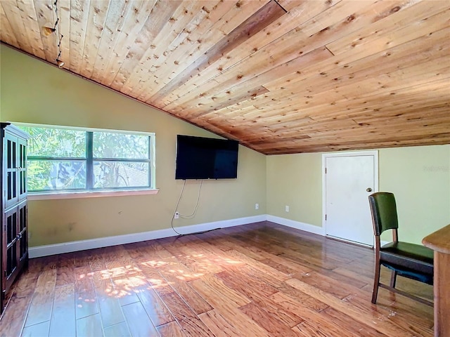 additional living space featuring lofted ceiling, wood-type flooring, and wooden ceiling