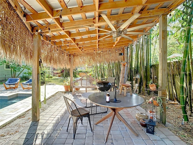 view of patio / terrace featuring ceiling fan