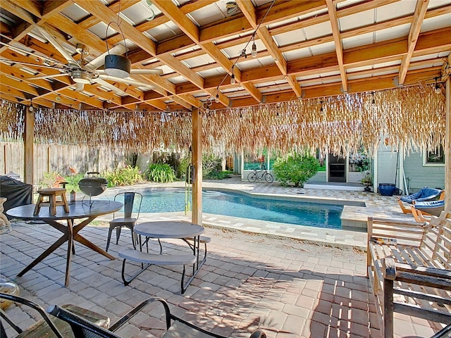 view of pool featuring a patio and ceiling fan