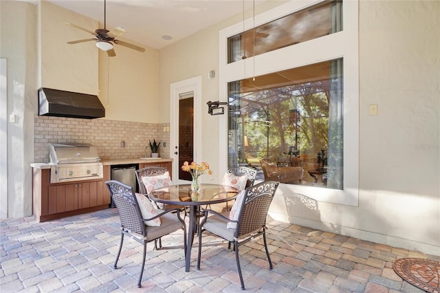 view of patio / terrace featuring area for grilling and ceiling fan