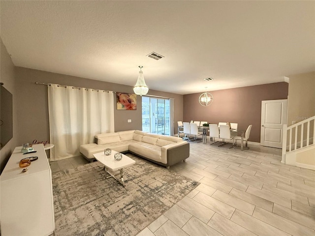 living room with a chandelier