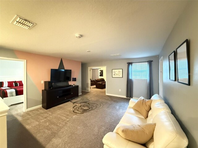 living room featuring carpet flooring