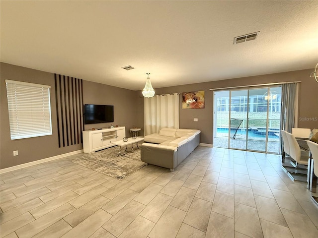 living room featuring a textured ceiling