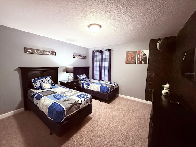 carpeted bedroom with a textured ceiling