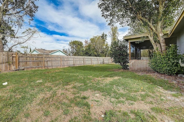 view of yard featuring a fenced backyard