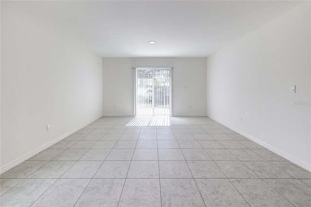 view of tiled spare room