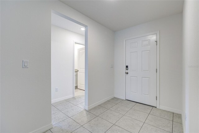 foyer with light tile patterned floors