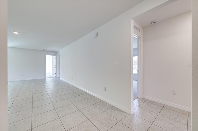 empty room featuring light tile patterned flooring