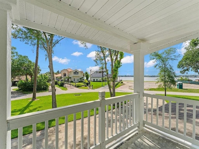 219 Nob Hill Cir, Longwood, FL 32779 - exterior space featuring a porch, a residential view, and a water view