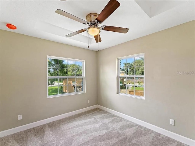 219 Nob Hill Cir, Longwood, FL 32779 - empty room featuring ceiling fan, baseboards, and light colored carpet