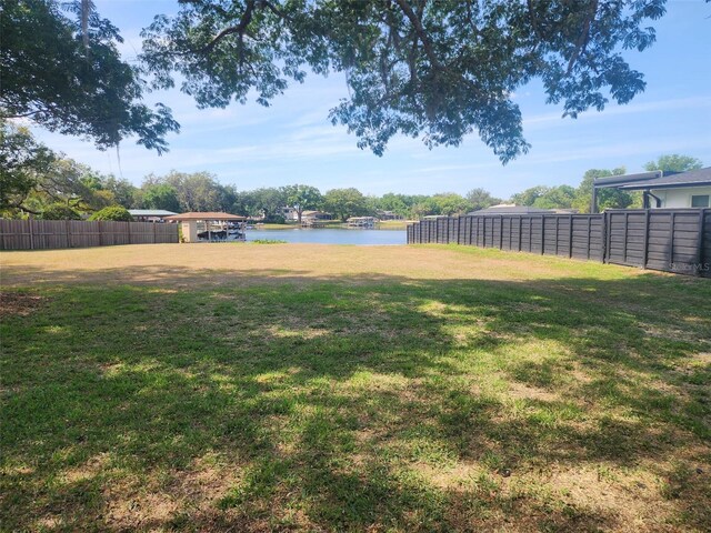219 Nob Hill Cir, Longwood, FL 32779 - view of yard featuring a water view and fence