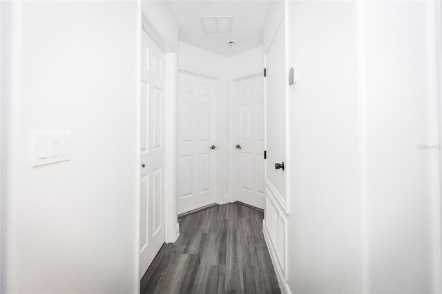 hallway featuring dark hardwood / wood-style floors