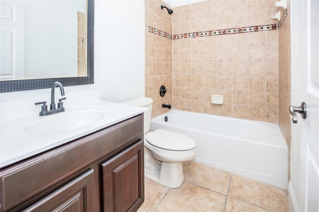 full bathroom with vanity, tile patterned flooring, toilet, and tiled shower / bath